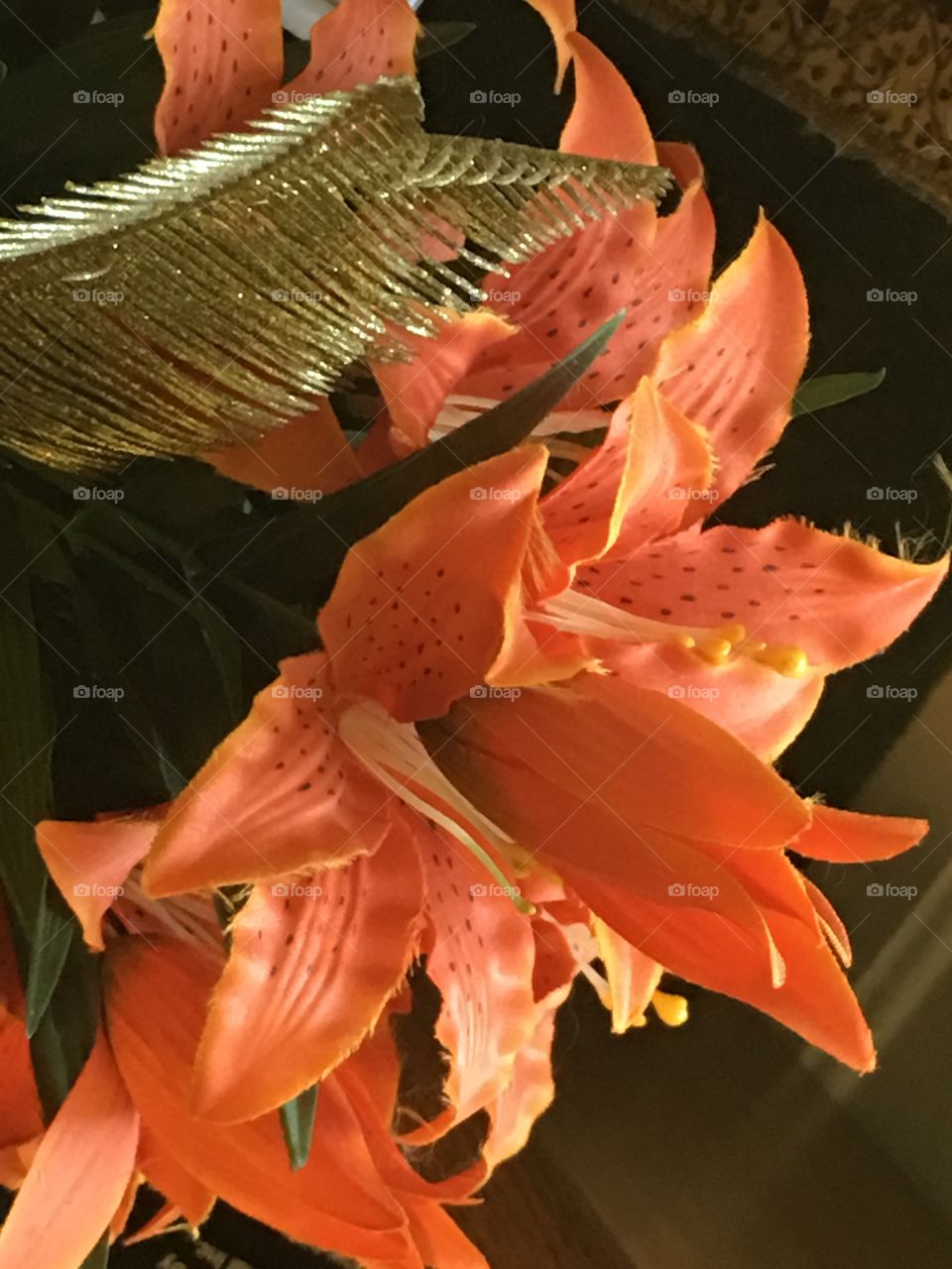 Gold leaf orange flower