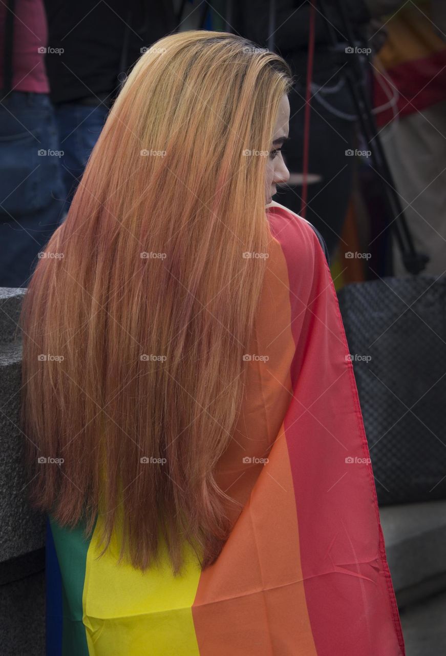 Long hair girl in rainbow flag outfit