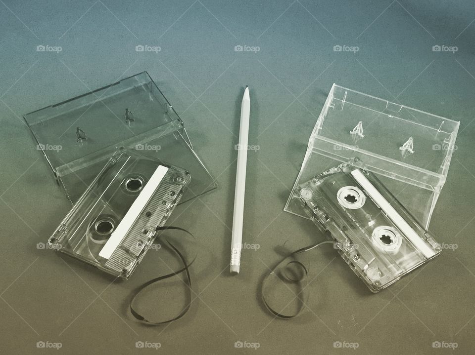 Classic musical cassette tapes with the fixing tool