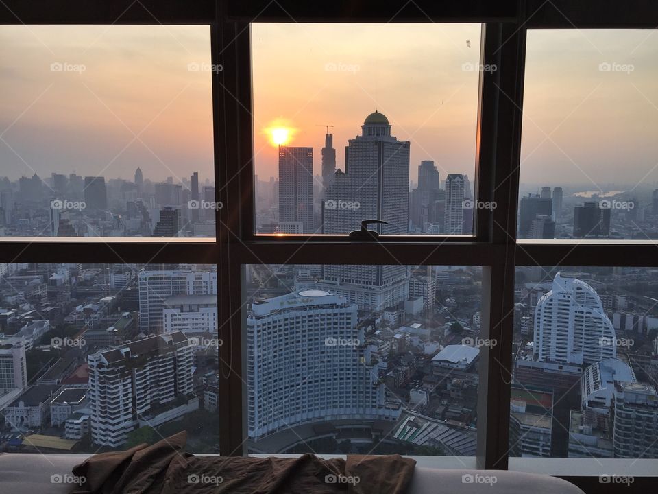 Bangkok sunrise through my bedroom window