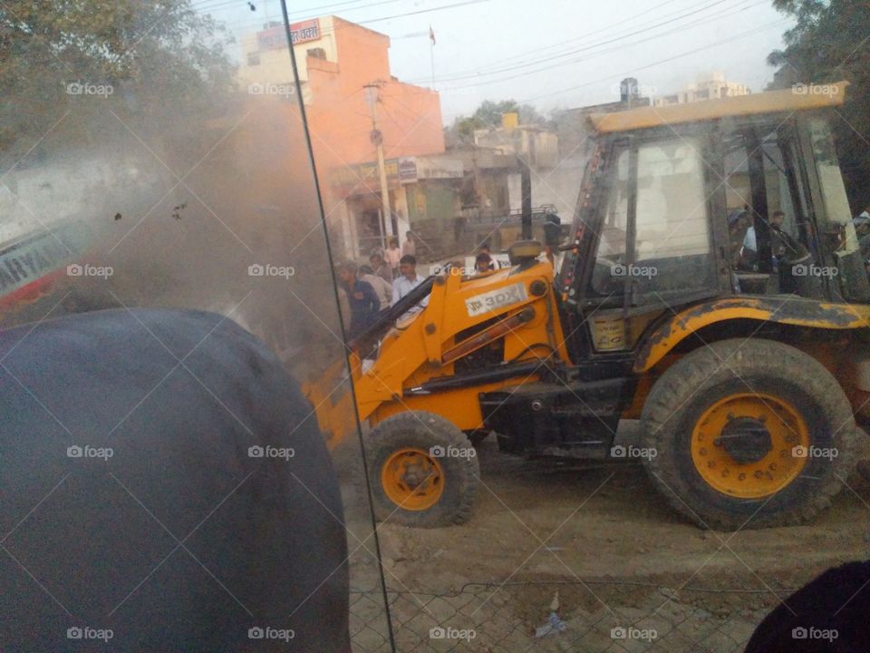 JCB lifting out the from a dig