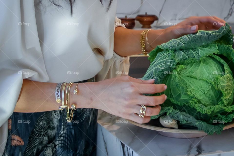 Woman's hands with her stylish jewellery on