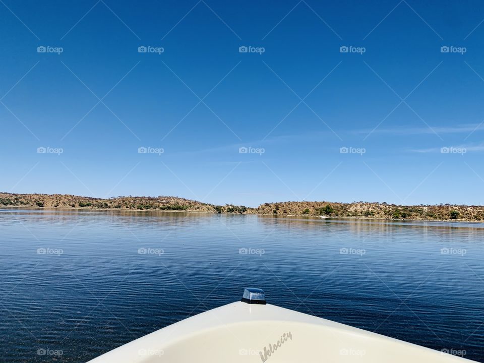 Blue lake meets blue sky