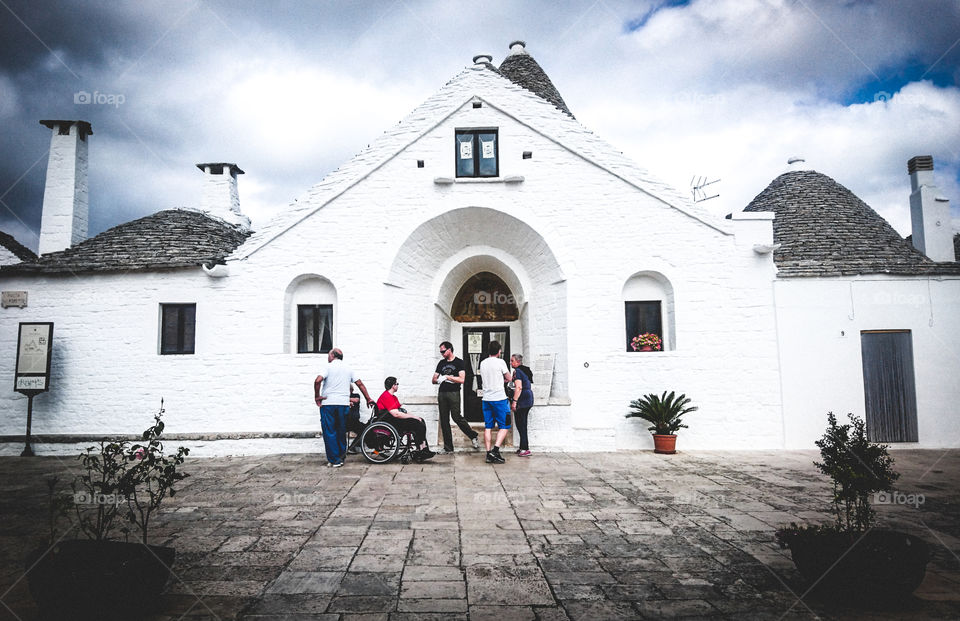 Tourists in Alberobello