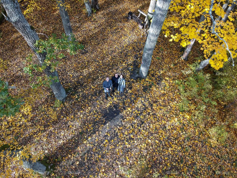 Family selfie from above during amazing walk in the forest.