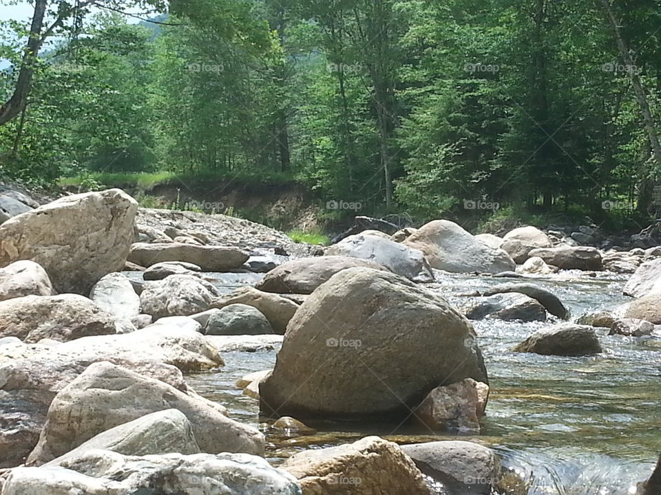 Rocks and the river rolls