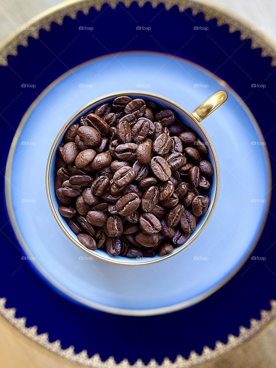 Whole Coffee Beans in Blue China Cup