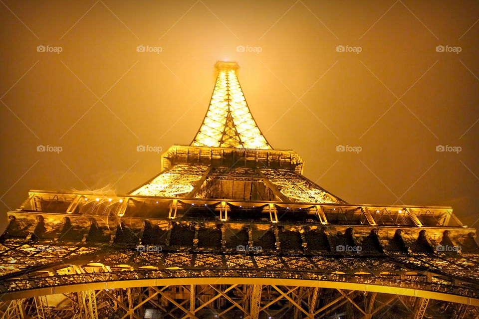 Pray for Paris!
Tower Eiffel of Paris at misty night
