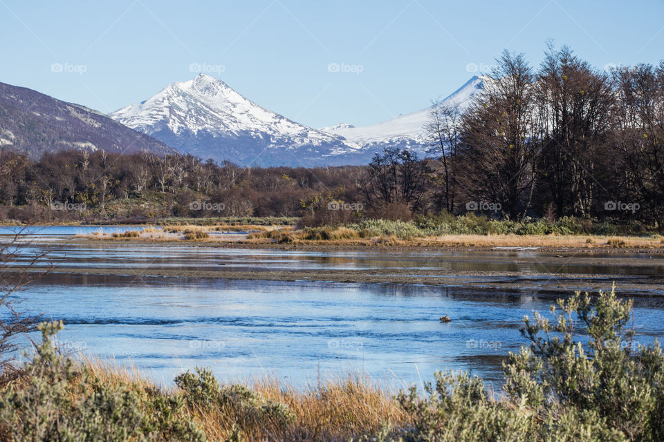 landscape of lake and snowy mountains