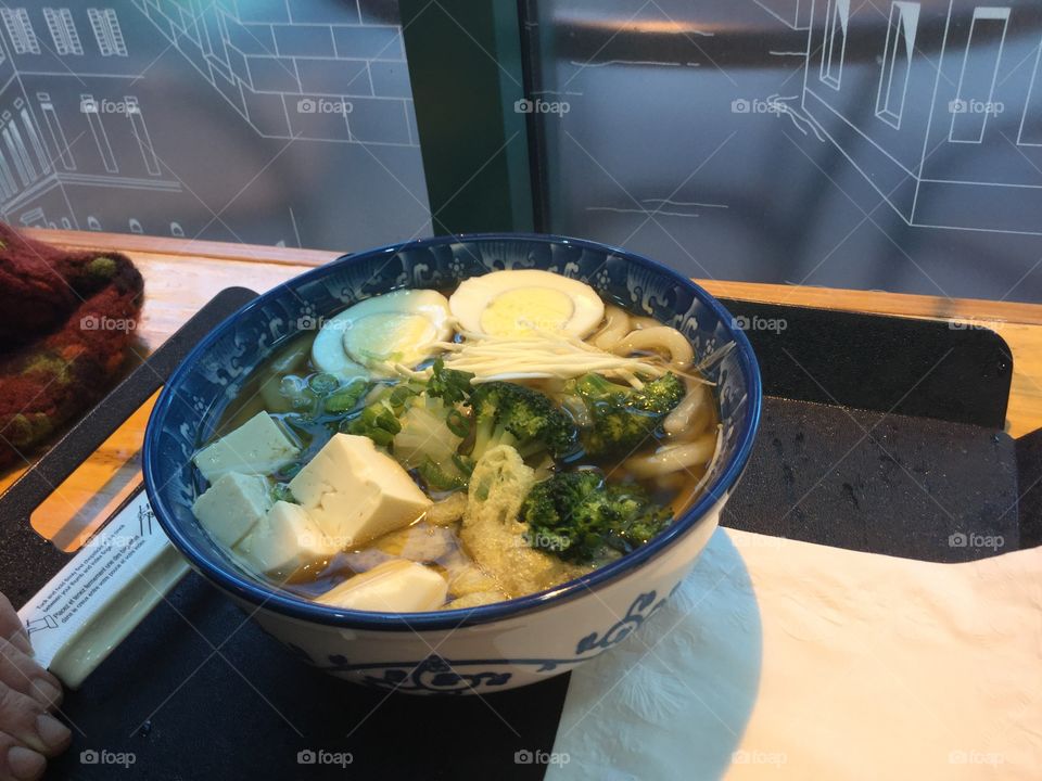 Asian Vegetarian Dish with Udon Noodles, Hardboiled Eggs, Vegetables, and Tofu