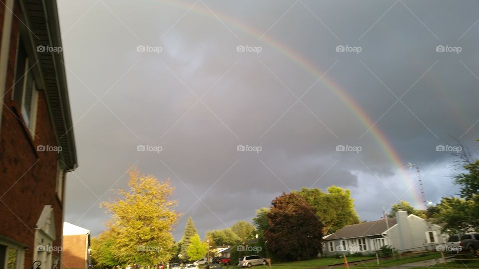 double rainbow on a cloudy day