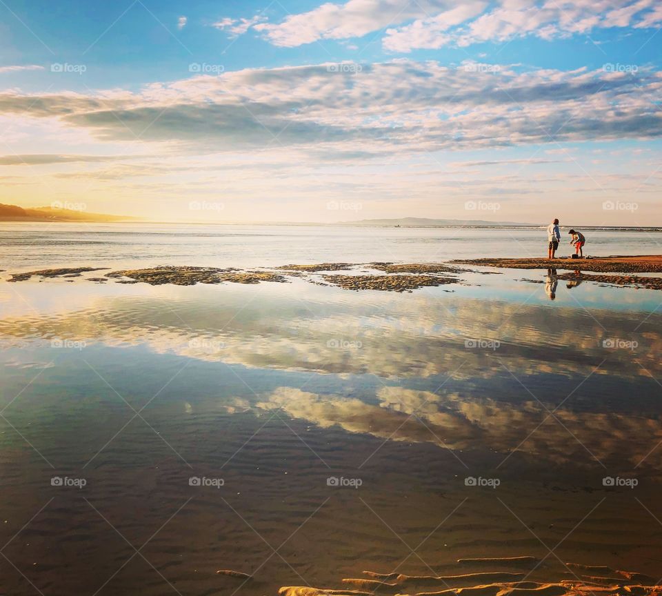 Sky, clouds, water. Reflections and the magical light in nature 