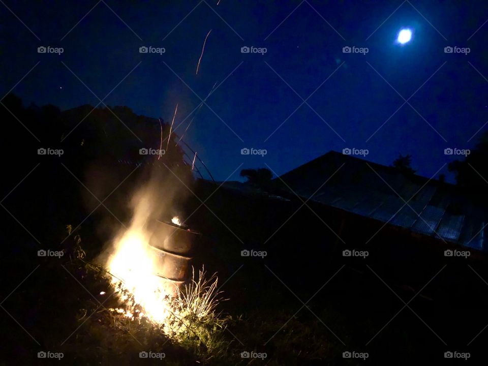 Burning Barrel and Bonfire, burning, barrel, bonfire, night, summer, moon, sky, reflection, corrugated, steel, shed, outbuilding, flames, brush, fire, smoke, billowing