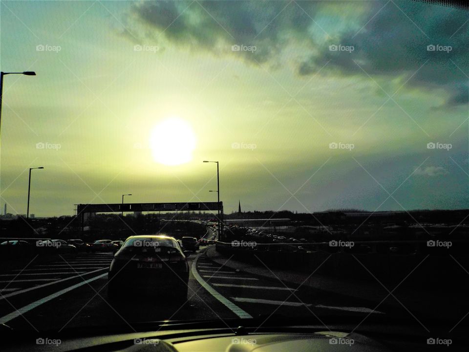 Spring sunset on busy road.. 