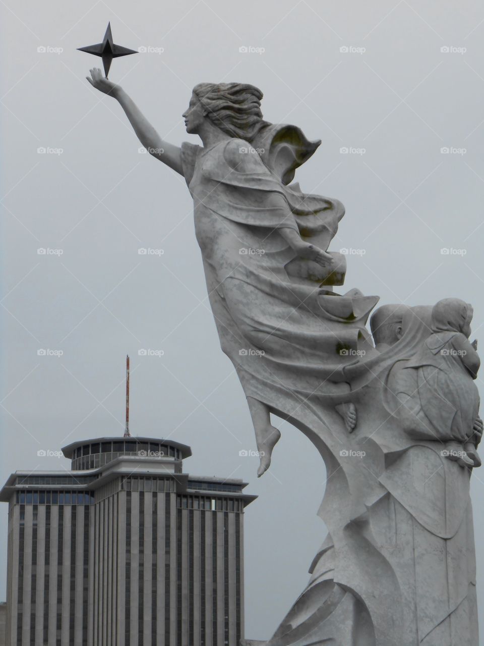 Different perspective of Immigrant monument. Angel watching over them?