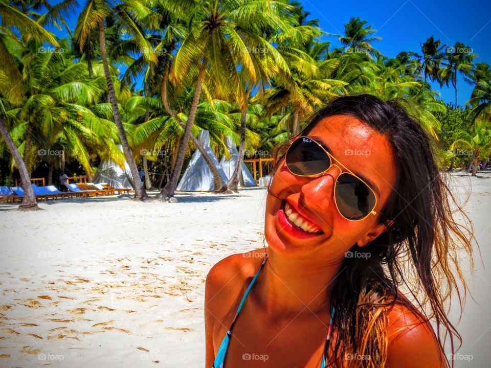Woman smiling in paradise
