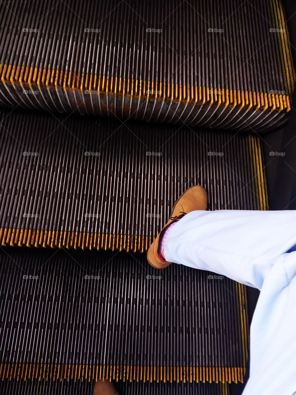Escalator and my leg