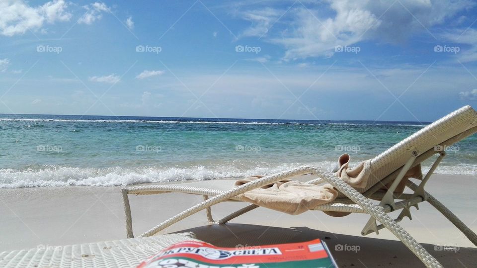 Casa de Campo beach, geographical magazine, blue waters, sunshine