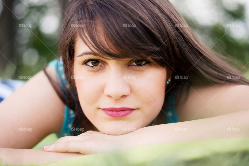 brunette girl. closeup portrait of a young brunette