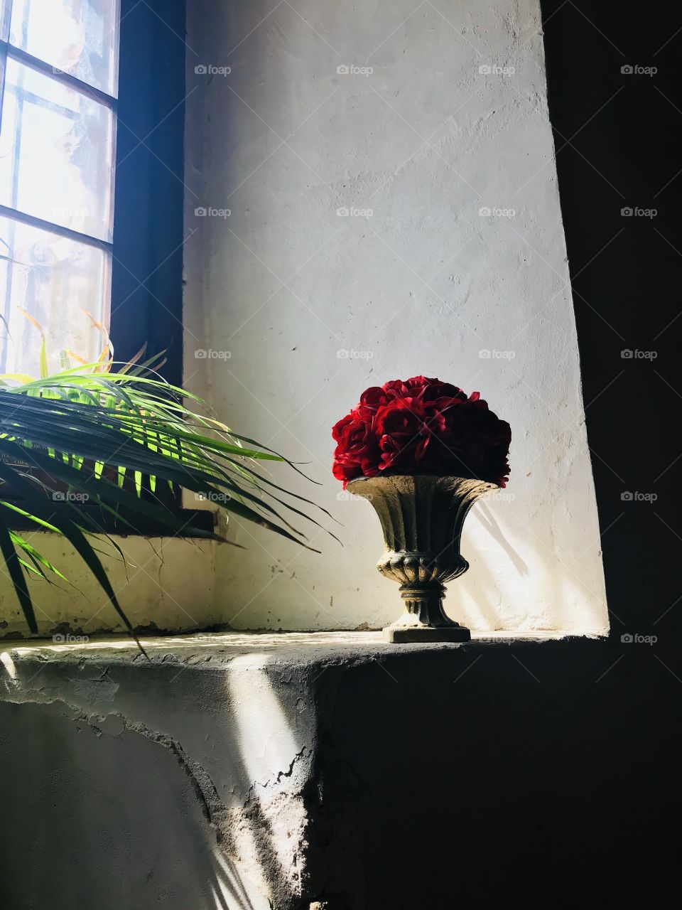 Bouquet of roses left in a church.