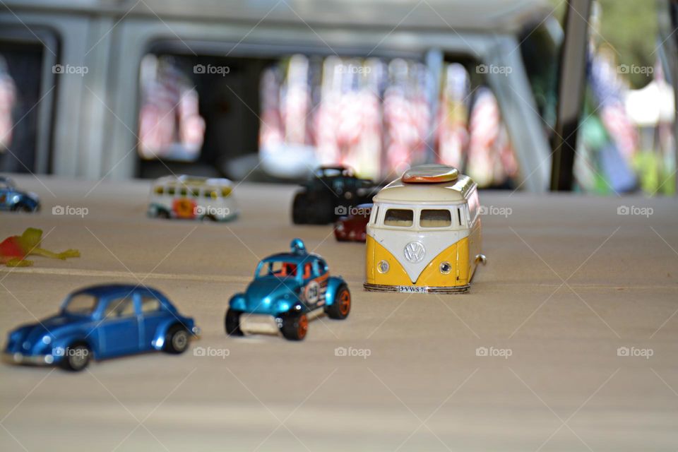 Cars with soul - A mock up inside of a Volkswagen bus showing varies kinds of Volkswagen. Use of bokeh