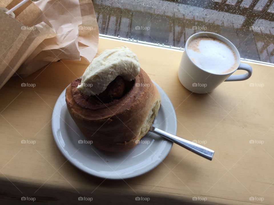 On a rainy West Coast day coffee break doesn’t get much better than a fresh brewed latte and a  still warm from the oven cinnamon bun with a generous dollop of cream cheese icing!