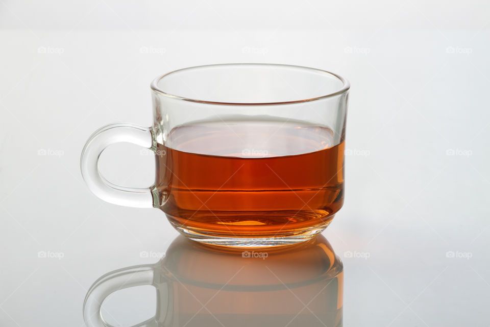 Tea glass cup on white background