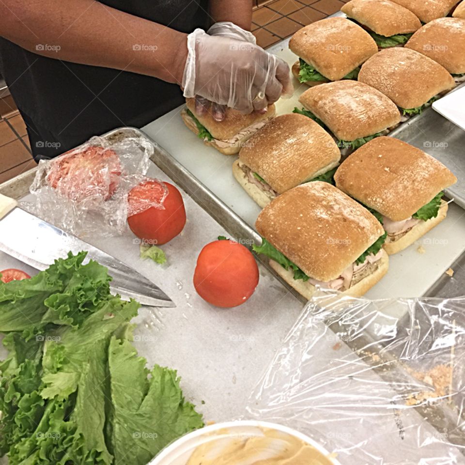 Making chicken salad sandwiches 