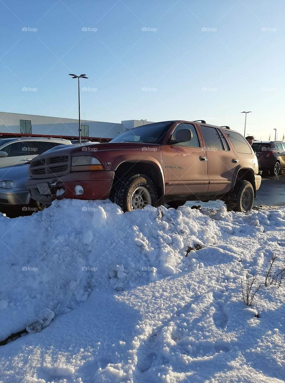 Everyday life. Dodge Durango parking where others can't. Grocery shopping