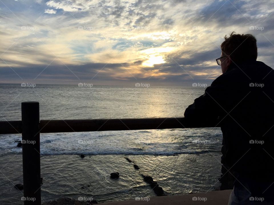 Man looking out to sea