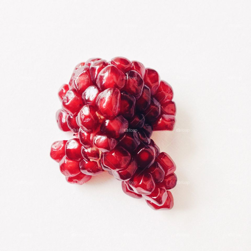 Close-up of a pomegranate on a white background