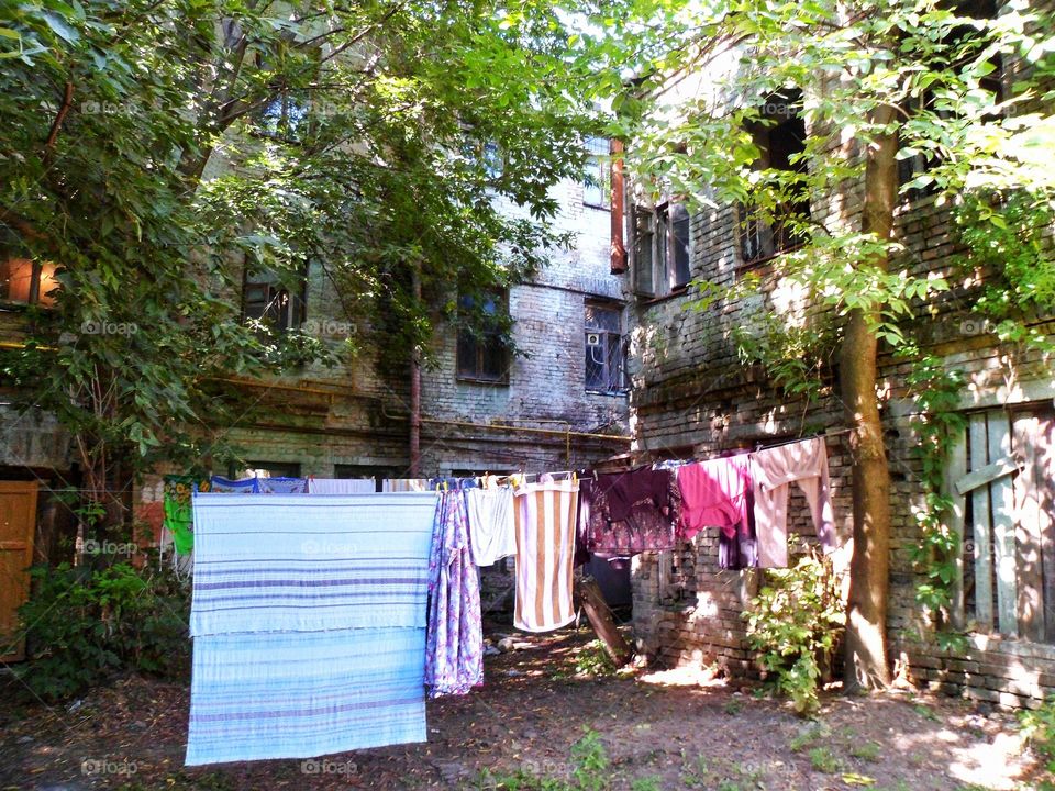 hanging clothes in the courtyard of the old district of the city of Kiev Podil