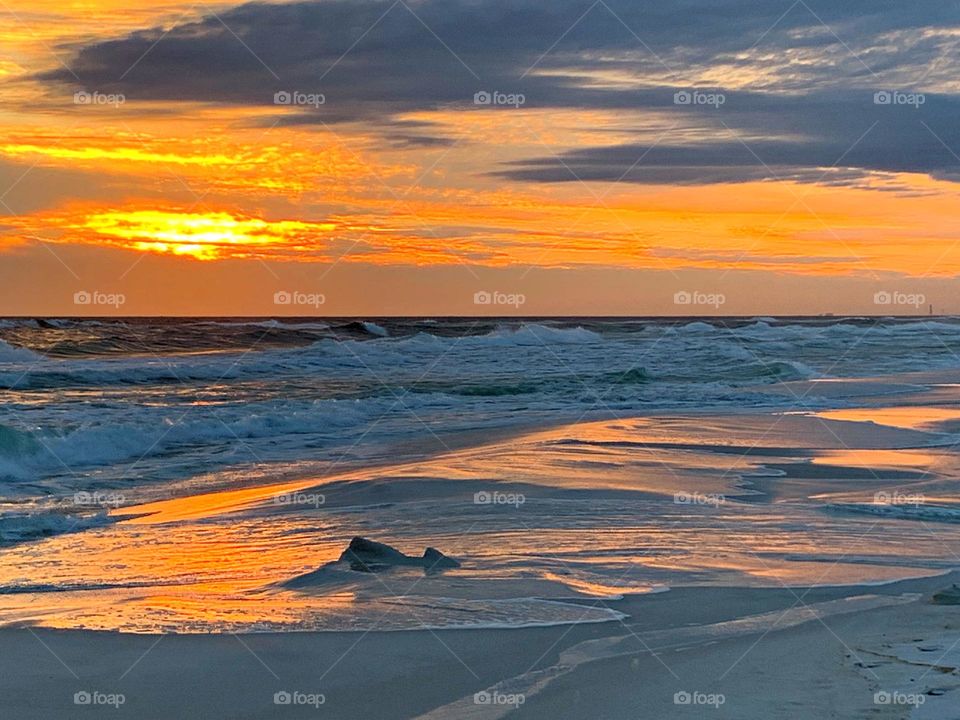 Spectacular sunset over the Gulf of Mexico - Sunset is the most beautiful when it draws to a close and the light  is illuminated before into the promises of darkness