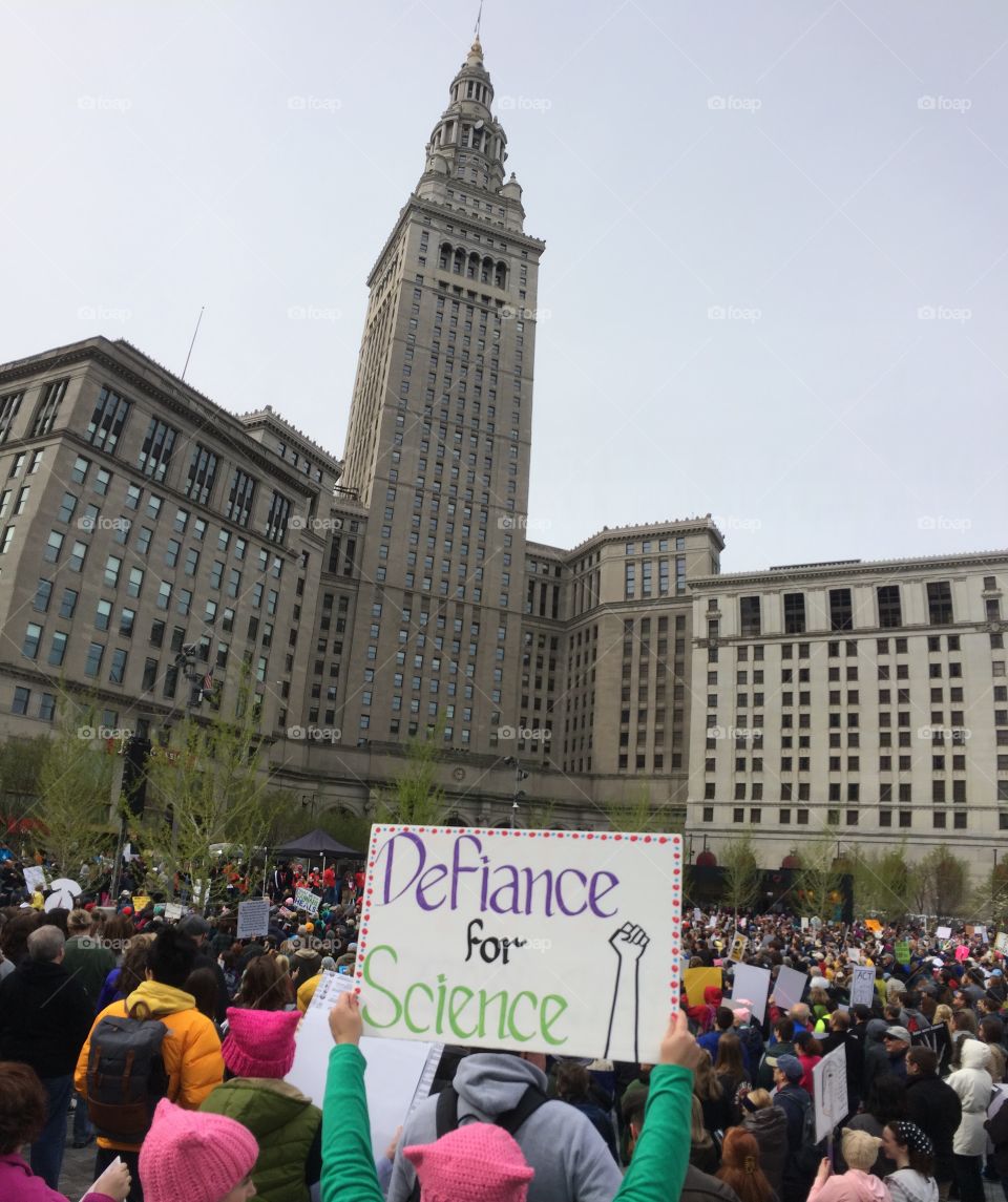 A crowd marching for science outside of the terminal tower in Cleveland on earth day
