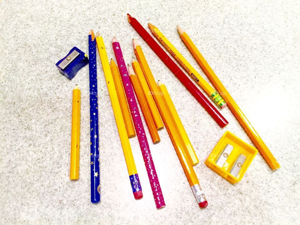 Colorful pencils and peck sharpeners 