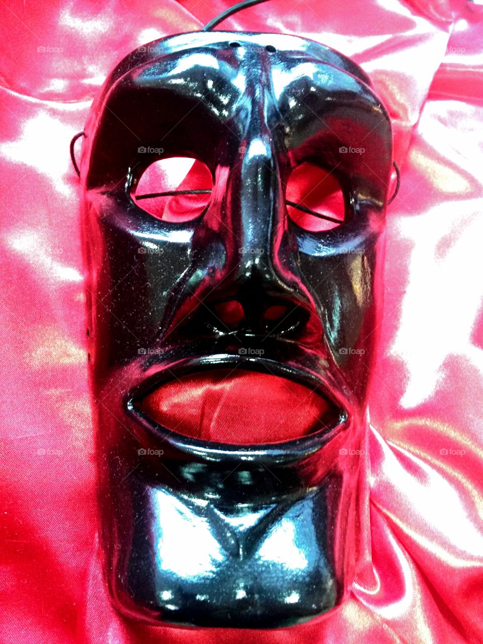 black sardinian mask in red