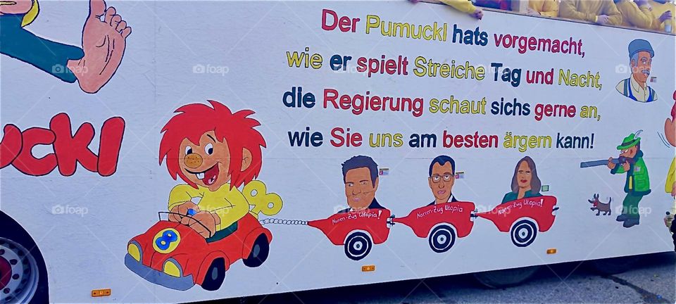 „Pumuckl“ is a funny kobold with red hair that stands up straight known for his ability to annoy people. Famous in Europe, not as much in the US he provides never ending ideas to the German government to upset its people. 2024. Hypnotic Productions