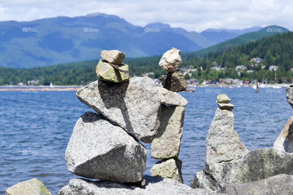 Ocean Harbour near Vancouver in Port Moody through a stone stack inukshuk inuksuk