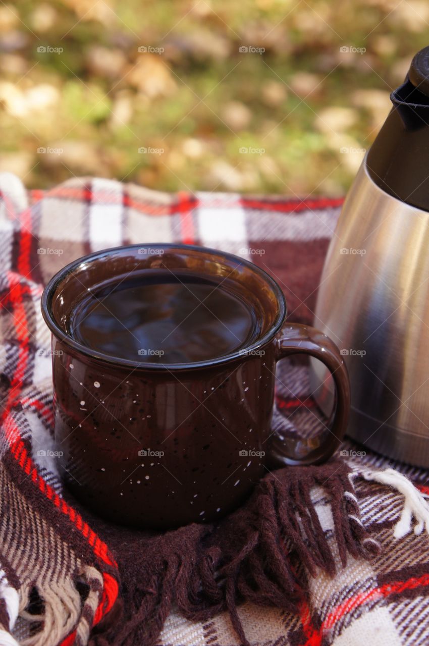 Close-up of coffee cup on table