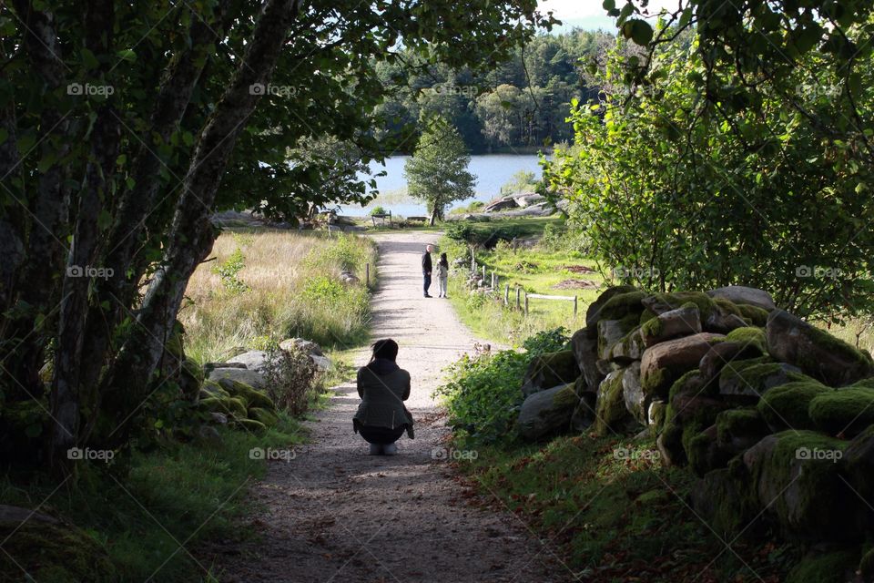 Girl on a path in the woods