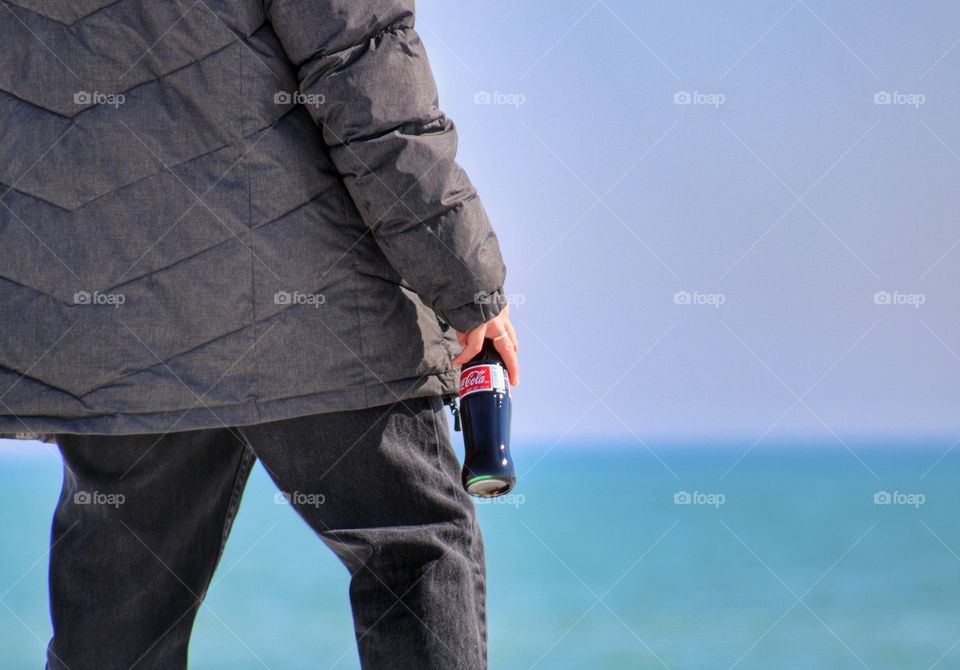 walking by the lake with Coca Cola