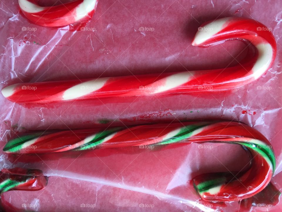Melting candy canes on waxed paper