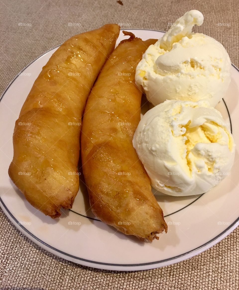 Fried banana fritters with ice cream 