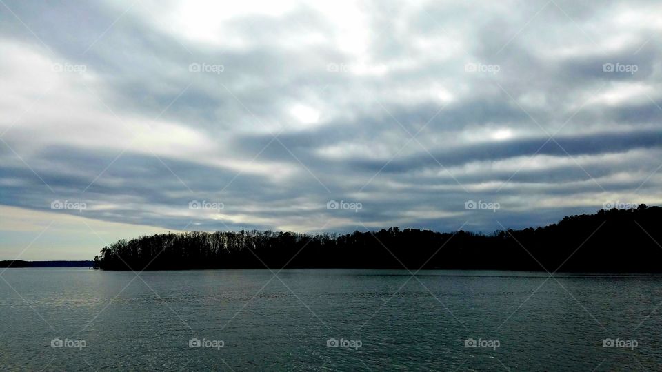 overcast skies, lake view