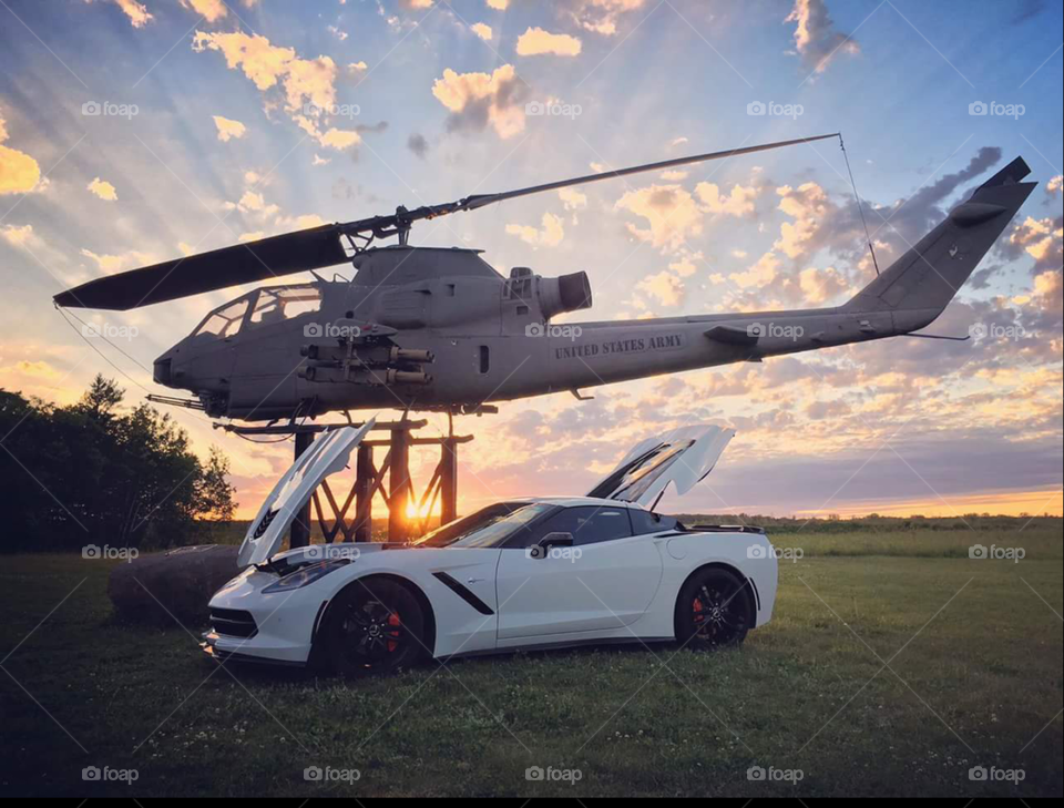 a corvette and helicopter