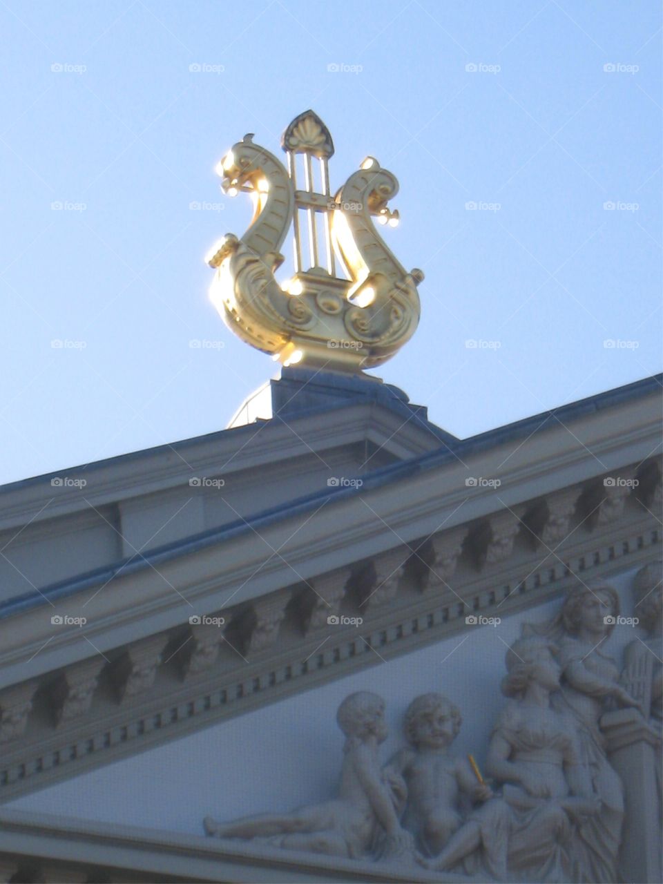 lyre atop concert hall in Amsterdam