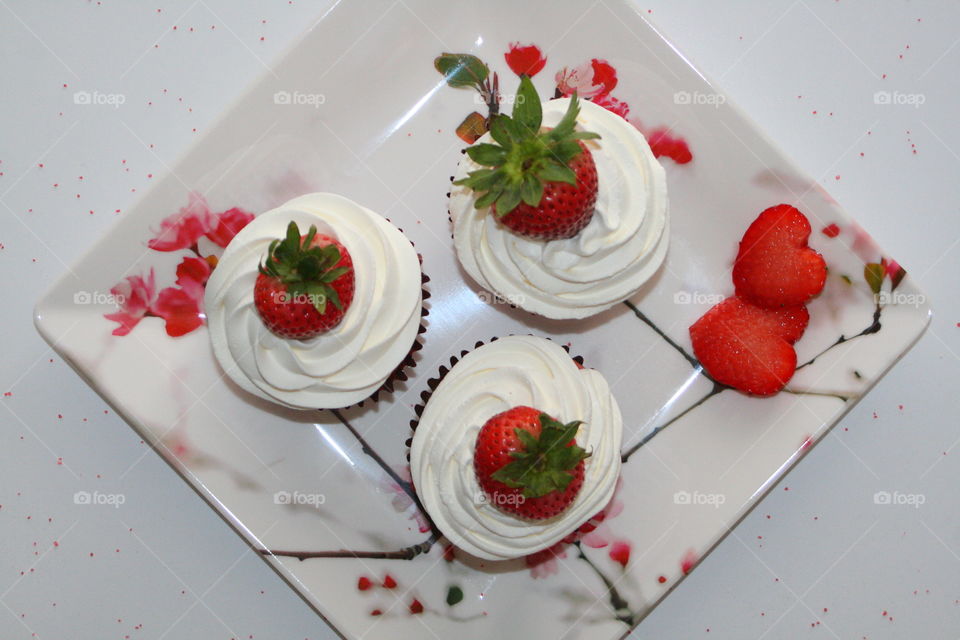 Strawberry cupcakes on plate