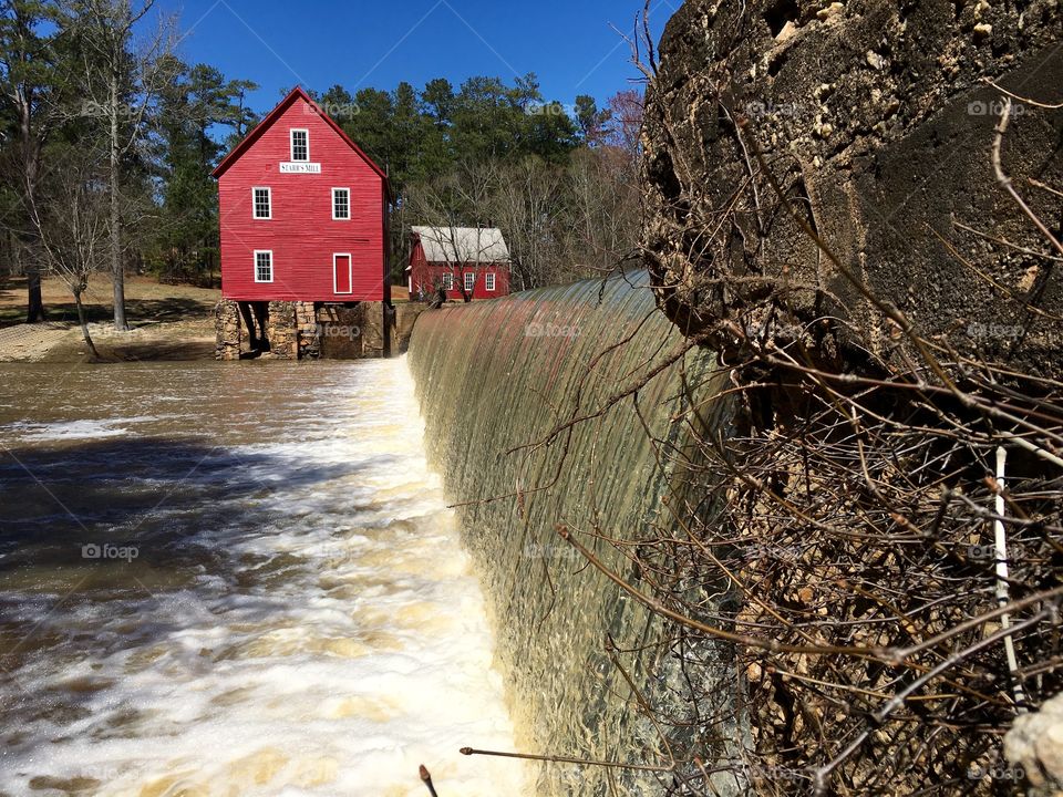 Red mill and waterfall