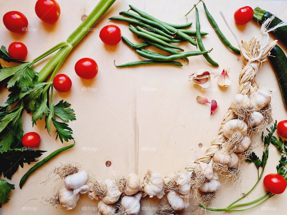 flat lay of a table with various vegetable ingredients