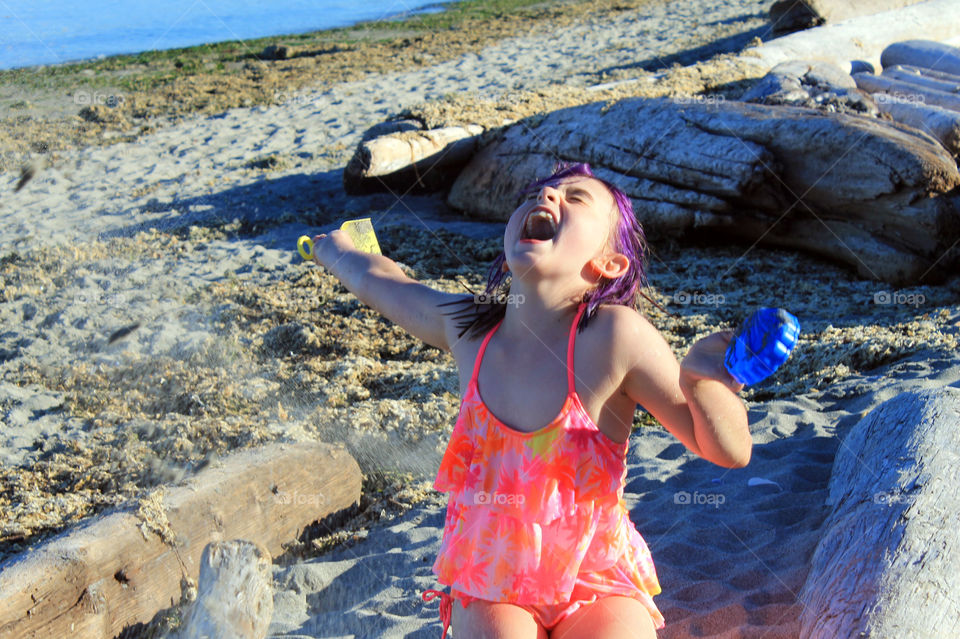 Summertime is all about the beach: sandcastles made with sand, shells & seaweed ; forts made with driftwood. Our purple haired youngest always loves to play at the beach & was laughing with sheer joy while flinging the sand in the air. 🏖